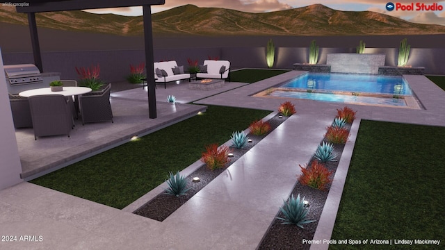 pool at dusk featuring a mountain view, area for grilling, and a patio area