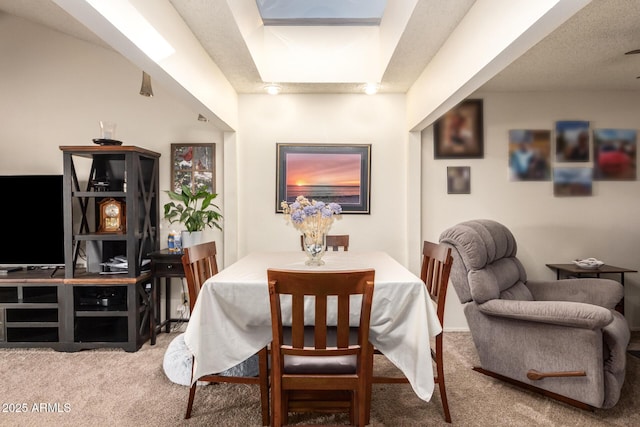 view of carpeted dining space