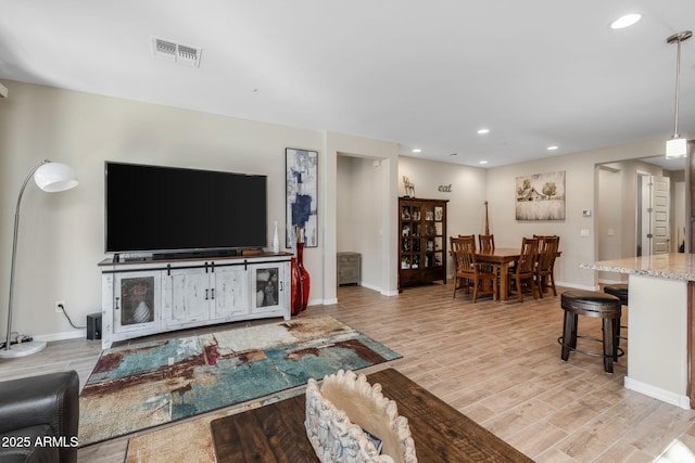 living room featuring light wood-type flooring