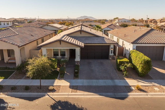 view of front of home with a garage