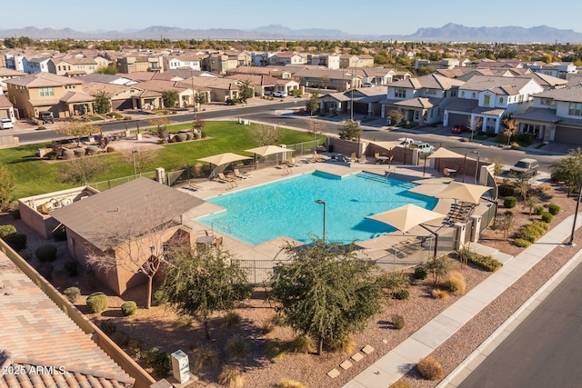 view of pool featuring a mountain view and a patio area