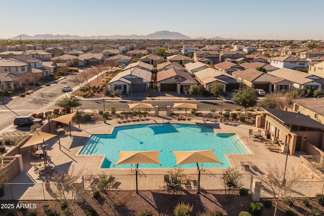 view of pool featuring a mountain view and a patio area