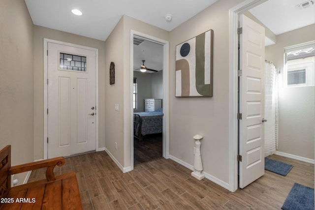 entryway with light hardwood / wood-style flooring