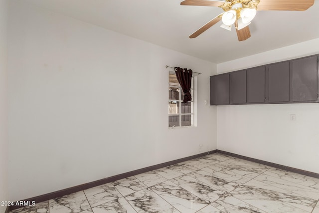 spare room featuring ceiling fan