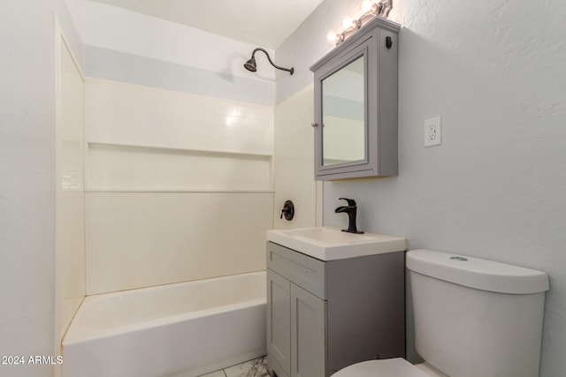 full bathroom with vanity, tiled shower / bath combo, and toilet