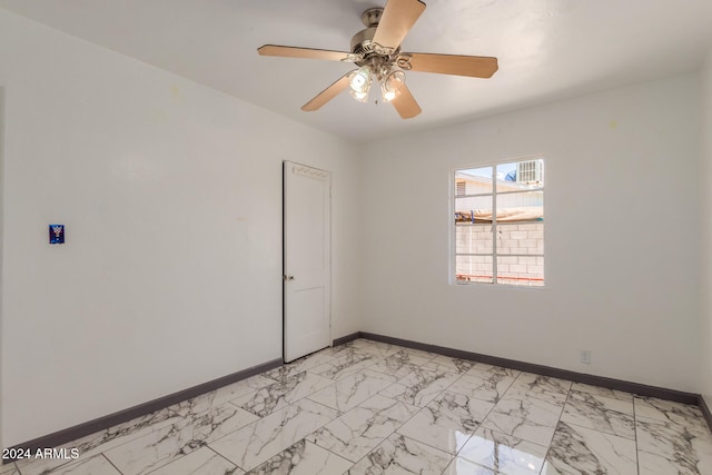 unfurnished room featuring ceiling fan