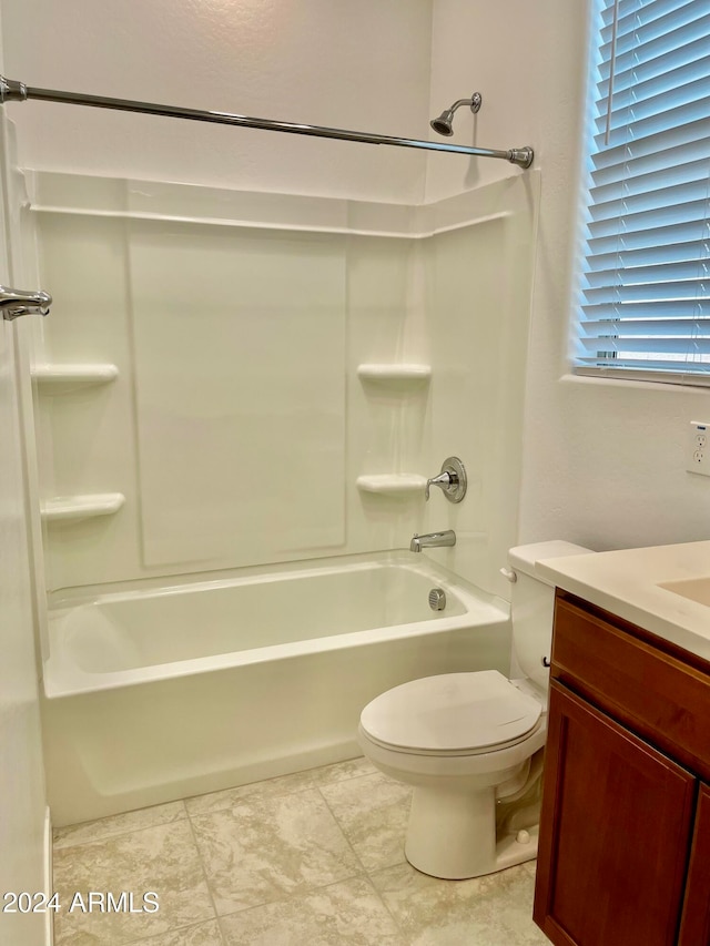 full bathroom featuring vanity, toilet, and tub / shower combination