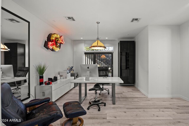 office space featuring light hardwood / wood-style flooring