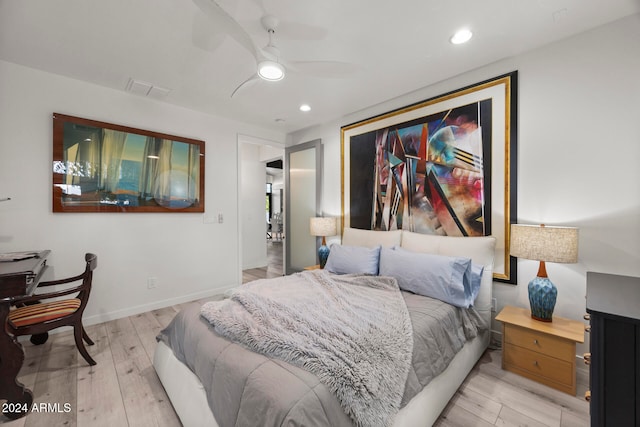 bedroom featuring ceiling fan and light hardwood / wood-style flooring