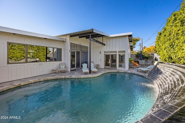 view of swimming pool featuring a patio