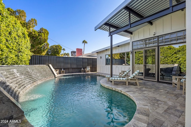 view of pool featuring a patio area