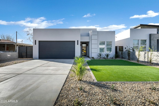 modern home with a front lawn and a garage