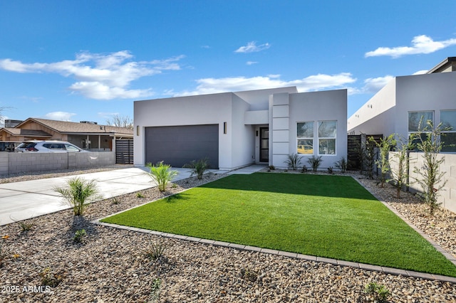 modern home with a garage and a front yard