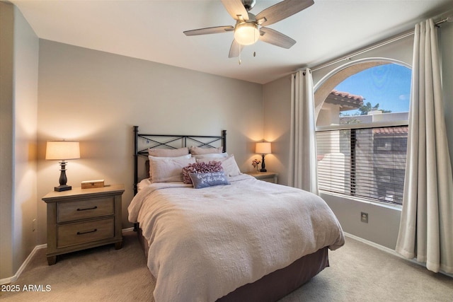 750 E Northern Ave Unit 2143, Phoenix, AZ 85020 - bedroom featuring light colored carpet, baseboards, and ceiling fan