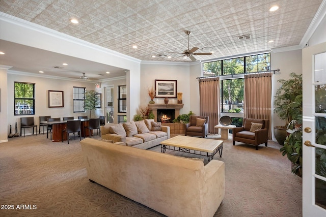 750 E Northern Ave Unit 2143, Phoenix, AZ 85020 - carpeted living area featuring a ceiling fan, crown molding, a lit fireplace, recessed lighting, and an office area