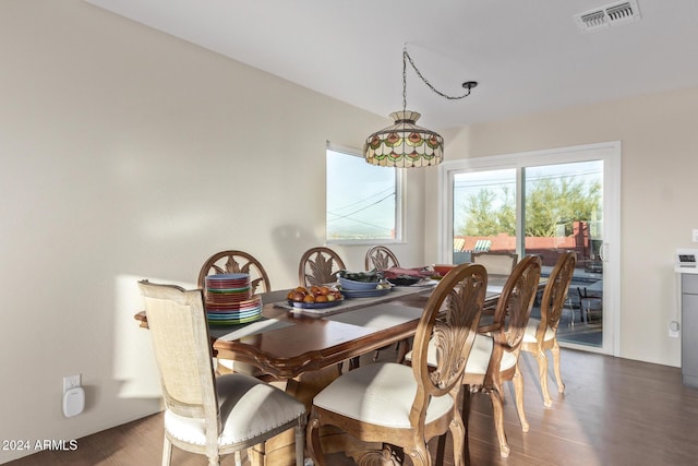 dining room featuring dark hardwood / wood-style flooring