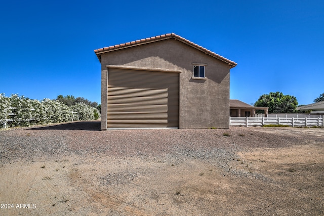 exterior space featuring a garage