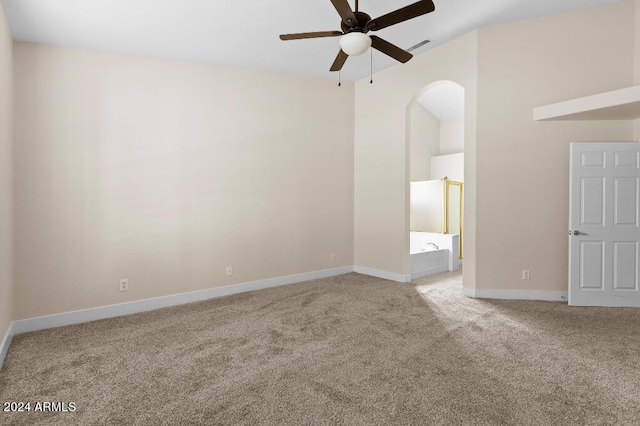 interior space with light colored carpet and ceiling fan