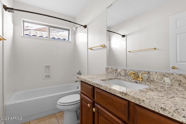 full bathroom featuring tile floors, toilet, bathing tub / shower combination, and vanity