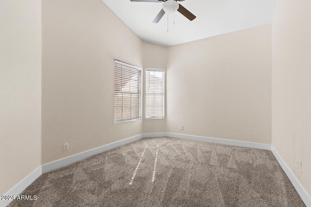 carpeted empty room with ceiling fan