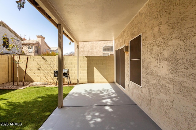 view of patio / terrace with fence