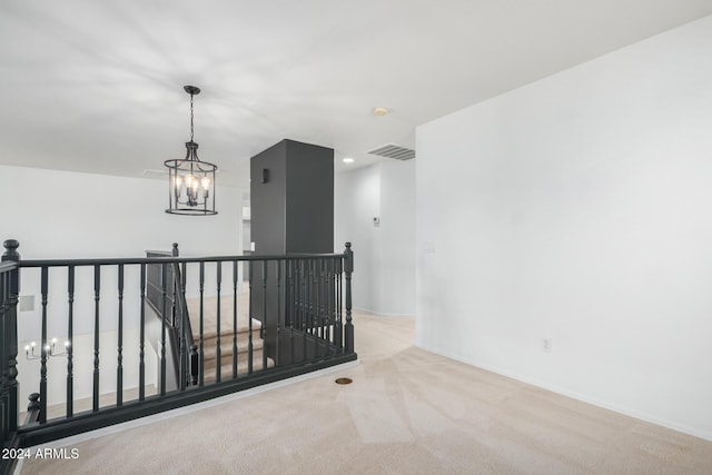 spare room with visible vents, baseboards, carpet, a chandelier, and recessed lighting