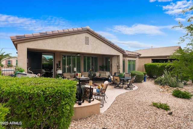 4200 E Narrowleaf Dr, Gilbert, AZ 85298 - rear view of property with an outdoor living space, a patio area, a tiled roof, and stucco siding