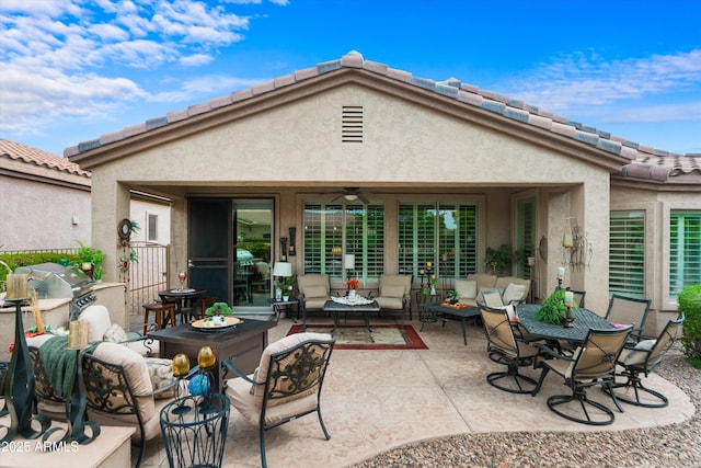 4200 E Narrowleaf Dr, Gilbert, AZ 85298 - back of property with an outdoor hangout area, a tiled roof, stucco siding, ceiling fan, and a patio