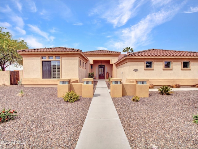 2724 W Fernwood Dr, Phoenix, AZ 85086 - view of front facade with stucco siding, fence, and a tile roof