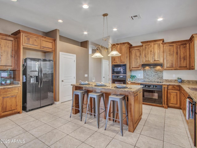 2724 W Fernwood Dr, Phoenix, AZ 85086 - kitchen featuring visible vents, brown cabinetry, black appliances, and extractor fan