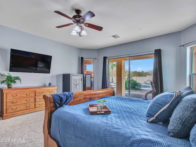 2724 W Fernwood Dr, Phoenix, AZ 85086 - carpeted bedroom with visible vents, access to exterior, and a ceiling fan