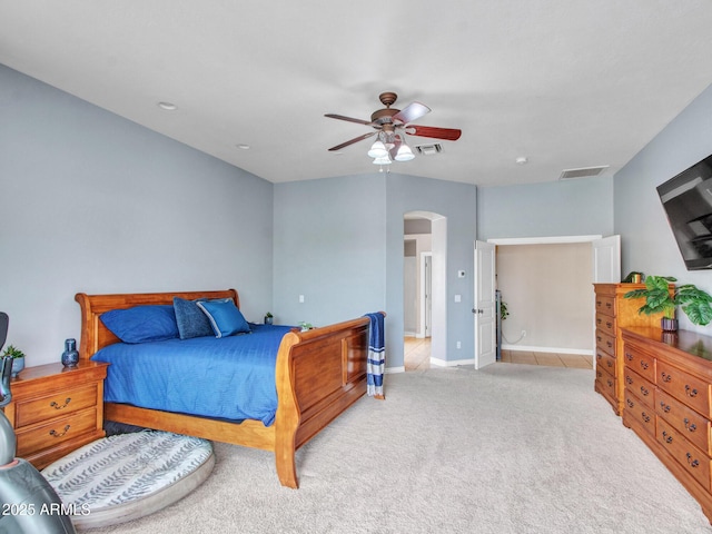 2724 W Fernwood Dr, Phoenix, AZ 85086 - bedroom featuring arched walkways, a ceiling fan, visible vents, and carpet floors