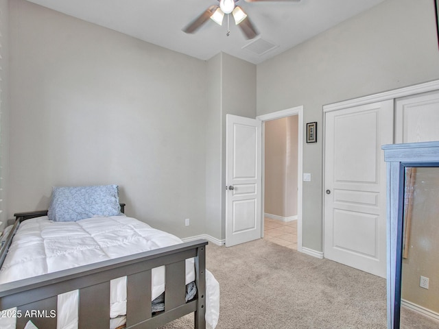 2724 W Fernwood Dr, Phoenix, AZ 85086 - bedroom featuring visible vents, baseboards, a closet, and light carpet