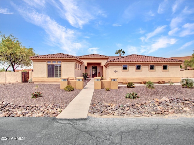 2724 W Fernwood Dr, Phoenix, AZ 85086 - view of front of house featuring stucco siding, fence, and a tile roof