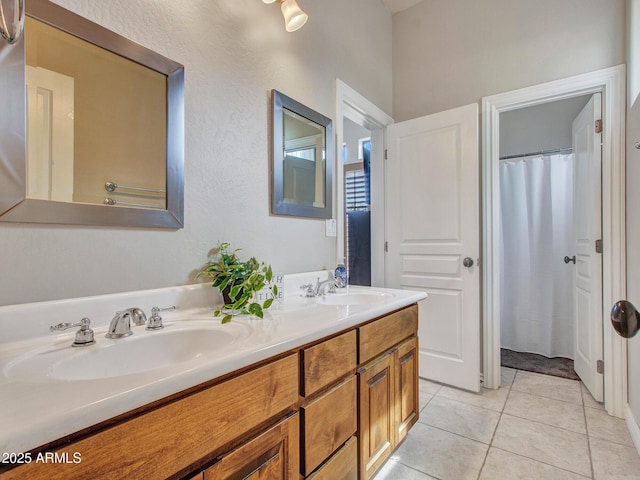 2724 W Fernwood Dr, Phoenix, AZ 85086 - full bath with tile patterned floors, double vanity, and a sink