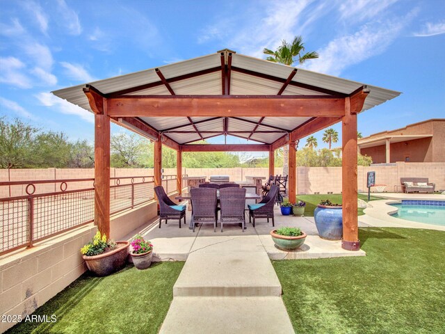 2724 W Fernwood Dr, Phoenix, AZ 85086 - view of patio with a gazebo, a fenced backyard, a fenced in pool, and outdoor dining area