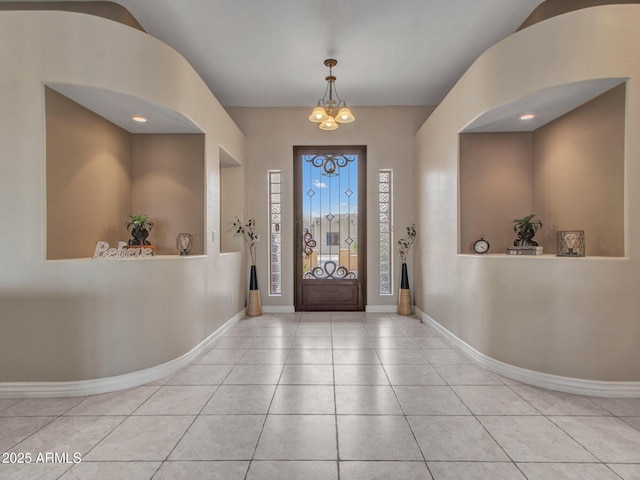 2724 W Fernwood Dr, Phoenix, AZ 85086 - tiled foyer entrance with a chandelier and baseboards