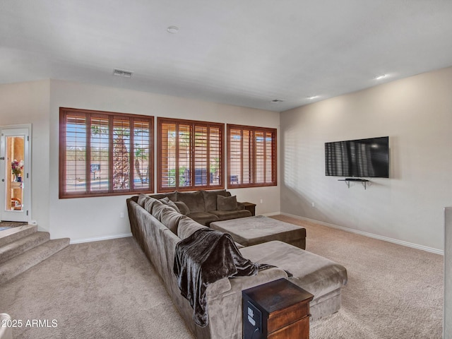 2724 W Fernwood Dr, Phoenix, AZ 85086 - living room featuring carpet, visible vents, and baseboards