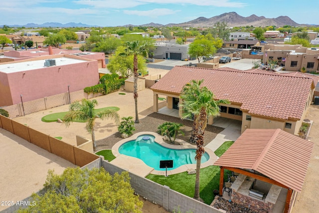 2724 W Fernwood Dr, Phoenix, AZ 85086 - exterior space with a fenced in pool, a residential view, a patio, a mountain view, and a fenced backyard