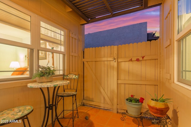 view of patio terrace at dusk