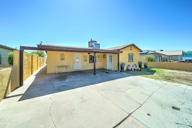 6541 N 54th Ave, Glendale, AZ 85301 - back of property with stucco siding and an attached carport