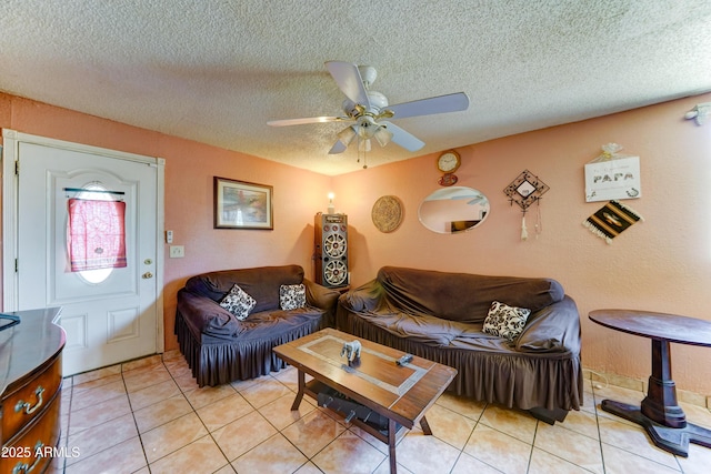 6541 N 54th Ave, Glendale, AZ 85301 - living area featuring a ceiling fan, a textured ceiling, and light tile patterned floors