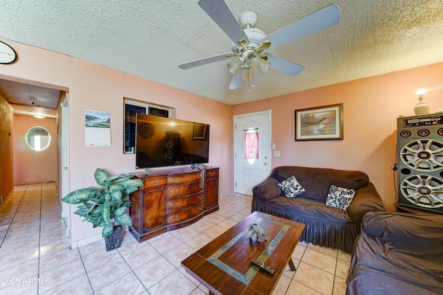 6541 N 54th Ave, Glendale, AZ 85301 - living area with a ceiling fan, a textured ceiling, and light tile patterned floors