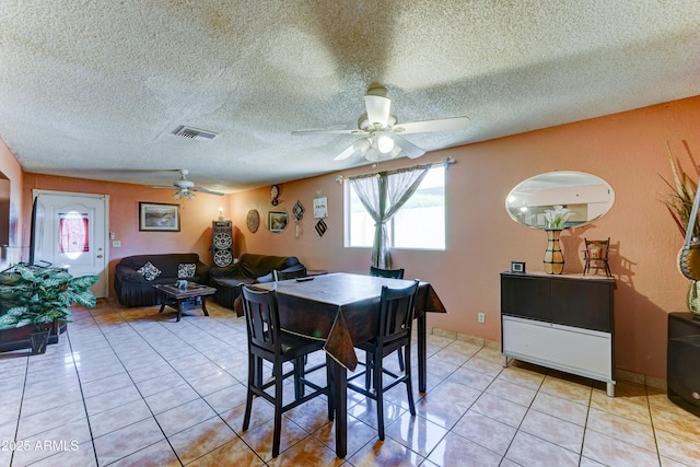 6541 N 54th Ave, Glendale, AZ 85301 - dining area with a ceiling fan, light tile patterned floors, and a textured ceiling