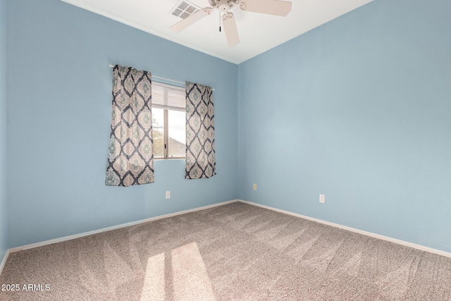 spare room with carpet flooring and ceiling fan