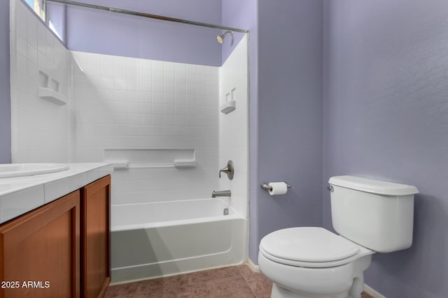 full bathroom with tile patterned flooring, vanity, bathtub / shower combination, and toilet