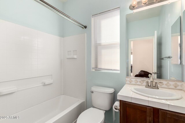 full bathroom featuring shower / tub combination, vanity, and toilet