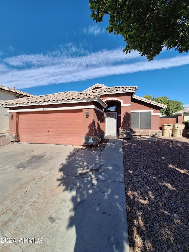 view of front of property featuring a garage