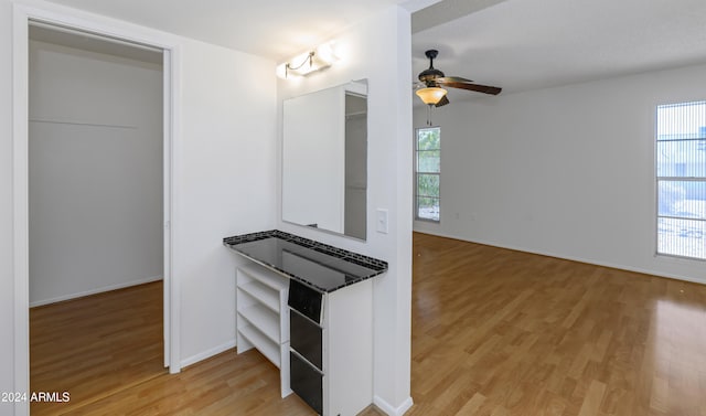 interior space featuring ceiling fan, a healthy amount of sunlight, and light hardwood / wood-style floors