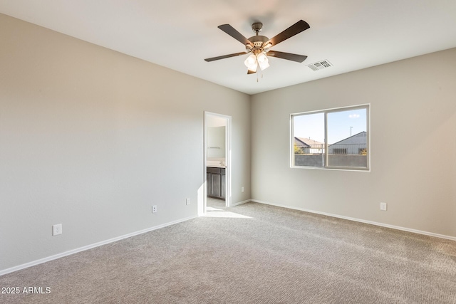 carpeted empty room with ceiling fan